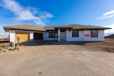 Experience luxury in this newly constructed Redlands masterpiece on The Golf Club At Redlands Mesa in Colorado - for sale on GolfHomes.com, golf home, golf lot