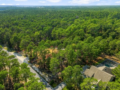 This .5-acre vacant lot is located in the gated Wild Heron on Sharks Tooth Golf Club in Florida - for sale on GolfHomes.com, golf home, golf lot