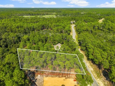 This .5-acre vacant lot is located in the gated Wild Heron on Sharks Tooth Golf Club in Florida - for sale on GolfHomes.com, golf home, golf lot