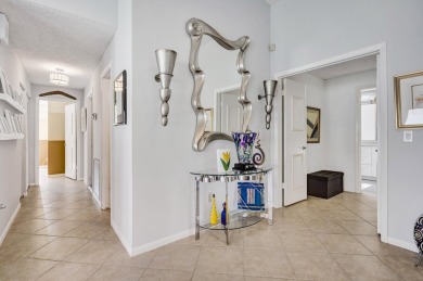 Come see this lovely three bedroom, two bathroom home in the on Boca Woods Country Club in Florida - for sale on GolfHomes.com, golf home, golf lot