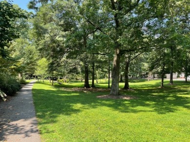 Nestled in the Quiet and Beautifully Landscaped Community of on Druid Hills Golf Club in Georgia - for sale on GolfHomes.com, golf home, golf lot