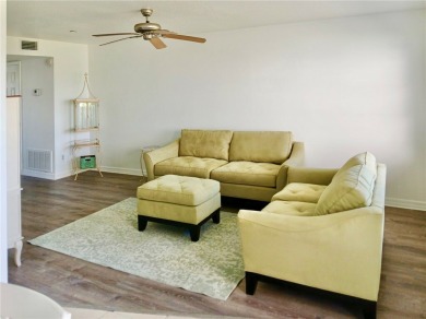 Charming 1st floor corner unit condominium One bedroom one- and on The American Golf Club in Florida - for sale on GolfHomes.com, golf home, golf lot