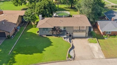 You will want this beautifully, updated home with views of Golf on Ponca City Country Club in Oklahoma - for sale on GolfHomes.com, golf home, golf lot