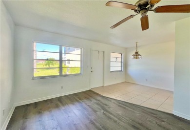 Charming 1st floor corner unit condominium One bedroom one- and on The American Golf Club in Florida - for sale on GolfHomes.com, golf home, golf lot