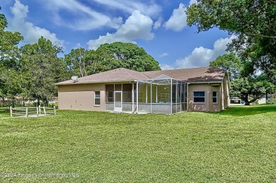 They don't build them like this anymore. This classic 3-bed on Oak Hills Country Club in Florida - for sale on GolfHomes.com, golf home, golf lot