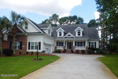 Presenting this custom-built 4-bedroom, 3-bathroom home in the on Sea Trail Golf Resort in North Carolina - for sale on GolfHomes.com, golf home, golf lot