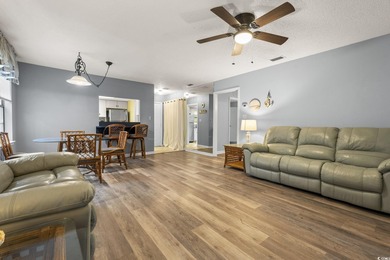 This well-maintained 2-bedroom, 2-bath home offers a bright on Heron Point Golf Club in South Carolina - for sale on GolfHomes.com, golf home, golf lot