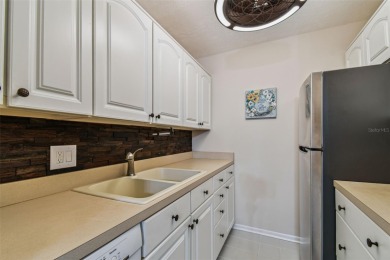 Welcome to this bright corner unit located on the second floor on Largo Golf Course in Florida - for sale on GolfHomes.com, golf home, golf lot