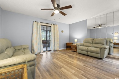 This well-maintained 2-bedroom, 2-bath home offers a bright on Heron Point Golf Club in South Carolina - for sale on GolfHomes.com, golf home, golf lot