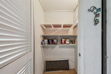 Welcome to this bright corner unit located on the second floor on Largo Golf Course in Florida - for sale on GolfHomes.com, golf home, golf lot