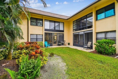 Welcome to this bright corner unit located on the second floor on Largo Golf Course in Florida - for sale on GolfHomes.com, golf home, golf lot