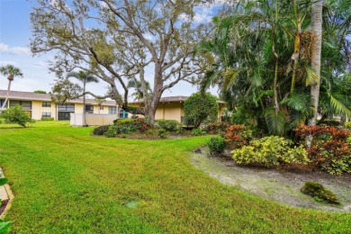 Welcome to this bright corner unit located on the second floor on Largo Golf Course in Florida - for sale on GolfHomes.com, golf home, golf lot