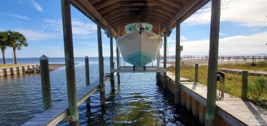 This exceptional .57-acre corner waterfront lot is a rare gem on Tiger Point Golf and Country Club in Florida - for sale on GolfHomes.com, golf home, golf lot