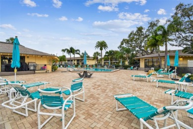 Welcome to this bright corner unit located on the second floor on Largo Golf Course in Florida - for sale on GolfHomes.com, golf home, golf lot