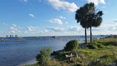 This exceptional .57-acre corner waterfront lot is a rare gem on Tiger Point Golf and Country Club in Florida - for sale on GolfHomes.com, golf home, golf lot