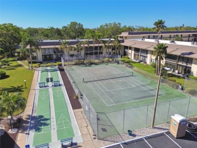 Welcome to this bright corner unit located on the second floor on Largo Golf Course in Florida - for sale on GolfHomes.com, golf home, golf lot