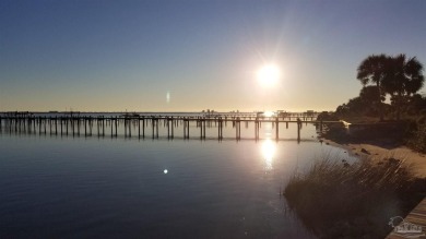 This exceptional .57-acre corner waterfront lot is a rare gem on Tiger Point Golf and Country Club in Florida - for sale on GolfHomes.com, golf home, golf lot