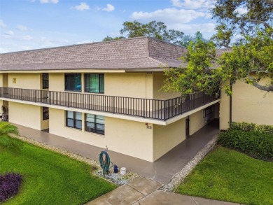 Welcome to this bright corner unit located on the second floor on Largo Golf Course in Florida - for sale on GolfHomes.com, golf home, golf lot