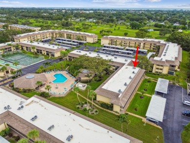 Welcome to this bright corner unit located on the second floor on Largo Golf Course in Florida - for sale on GolfHomes.com, golf home, golf lot