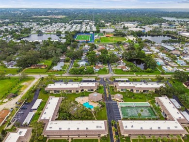 Welcome to this bright corner unit located on the second floor on Largo Golf Course in Florida - for sale on GolfHomes.com, golf home, golf lot