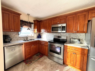 Beautiful Golf course view condo  in the 55+ community of the on Poinciana Golf Club in Florida - for sale on GolfHomes.com, golf home, golf lot