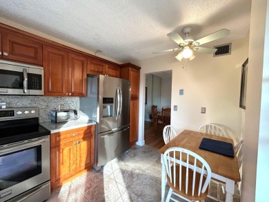 Beautiful Golf course view condo  in the 55+ community of the on Poinciana Golf Club in Florida - for sale on GolfHomes.com, golf home, golf lot