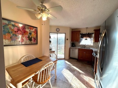 Beautiful Golf course view condo  in the 55+ community of the on Poinciana Golf Club in Florida - for sale on GolfHomes.com, golf home, golf lot
