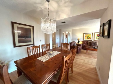 Beautiful Golf course view condo  in the 55+ community of the on Poinciana Golf Club in Florida - for sale on GolfHomes.com, golf home, golf lot