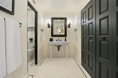 Nestled serenely on the front row, this extraordinary estate on Pelican Hill Golf Club in California - for sale on GolfHomes.com, golf home, golf lot