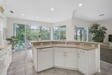 Nestled within the serene, winding streets of the sought-after on Calusa Lakes Golf Club in Florida - for sale on GolfHomes.com, golf home, golf lot
