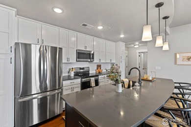 Luxury meets convenience in this stunning 1-bed, 1-bath condo on Highland Meadows Golf Course in Colorado - for sale on GolfHomes.com, golf home, golf lot