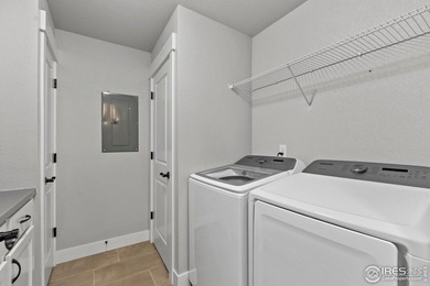 Luxury meets convenience in this stunning 1-bed, 1-bath condo on Highland Meadows Golf Course in Colorado - for sale on GolfHomes.com, golf home, golf lot