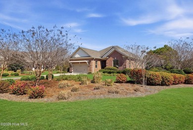 This all-brick home built in 2017 enjoys expansive pond views on Members Club At St. James Plantation in North Carolina - for sale on GolfHomes.com, golf home, golf lot