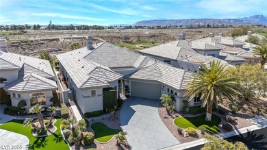 Among Summerlin's most distinguished addresses, this TPC Canyon on Badlands Golf Club in Nevada - for sale on GolfHomes.com, golf home, golf lot