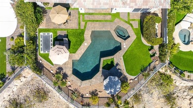 Among Summerlin's most distinguished addresses, this TPC Canyon on Badlands Golf Club in Nevada - for sale on GolfHomes.com, golf home, golf lot