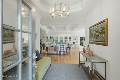 This all-brick home built in 2017 enjoys expansive pond views on Members Club At St. James Plantation in North Carolina - for sale on GolfHomes.com, golf home, golf lot