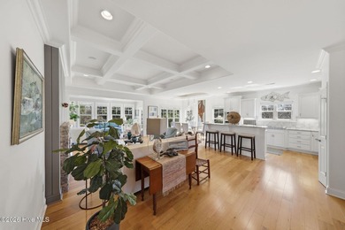 This all-brick home built in 2017 enjoys expansive pond views on Members Club At St. James Plantation in North Carolina - for sale on GolfHomes.com, golf home, golf lot