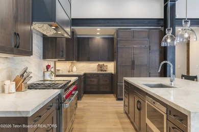 Step into this premier mountain modern home, perfectly sited on on Snake River Sporting Club in Wyoming - for sale on GolfHomes.com, golf home, golf lot