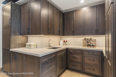 Step into this premier mountain modern home, perfectly sited on on Snake River Sporting Club in Wyoming - for sale on GolfHomes.com, golf home, golf lot