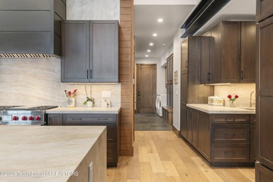 Step into this premier mountain modern home, perfectly sited on on Snake River Sporting Club in Wyoming - for sale on GolfHomes.com, golf home, golf lot