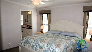 This well-maintained 2014 Nobility Lindsay, owned and occupied on Cypresswood Golf and Country Club in Florida - for sale on GolfHomes.com, golf home, golf lot