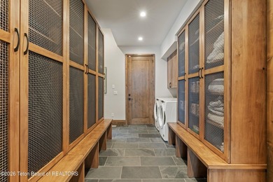 Step into this premier mountain modern home, perfectly sited on on Snake River Sporting Club in Wyoming - for sale on GolfHomes.com, golf home, golf lot