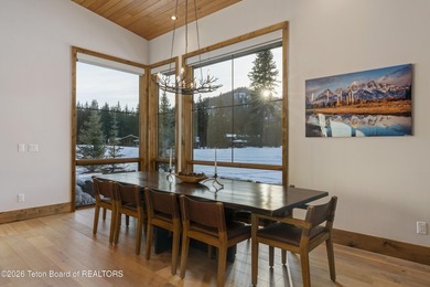 Step into this premier mountain modern home, perfectly sited on on Snake River Sporting Club in Wyoming - for sale on GolfHomes.com, golf home, golf lot