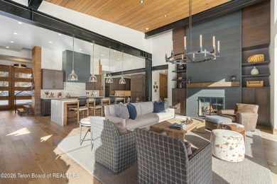 Step into this premier mountain modern home, perfectly sited on on Snake River Sporting Club in Wyoming - for sale on GolfHomes.com, golf home, golf lot