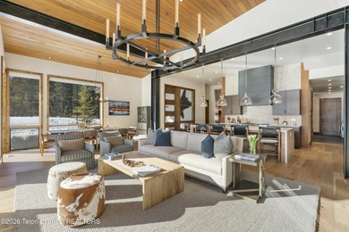 Step into this premier mountain modern home, perfectly sited on on Snake River Sporting Club in Wyoming - for sale on GolfHomes.com, golf home, golf lot