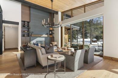 Step into this premier mountain modern home, perfectly sited on on Snake River Sporting Club in Wyoming - for sale on GolfHomes.com, golf home, golf lot