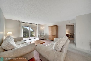 SPACIOUS 2/2 PENTHOUSE CORNER UNIT IN MANICURED 55+ LAKES OF on Inverrary Country Club in Florida - for sale on GolfHomes.com, golf home, golf lot