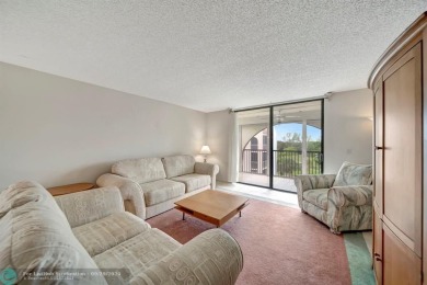 SPACIOUS 2/2 PENTHOUSE CORNER UNIT IN MANICURED 55+ LAKES OF on Inverrary Country Club in Florida - for sale on GolfHomes.com, golf home, golf lot