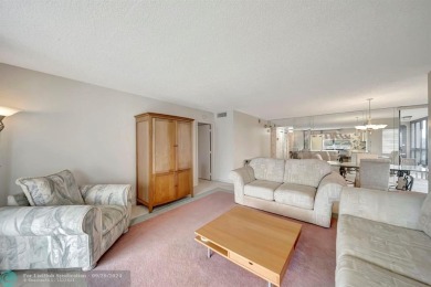SPACIOUS 2/2 PENTHOUSE CORNER UNIT IN MANICURED 55+ LAKES OF on Inverrary Country Club in Florida - for sale on GolfHomes.com, golf home, golf lot