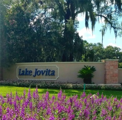 Welcome to Casual Elegance in the highly desirable, GATED on Lake Jovita Golf and Country Club in Florida - for sale on GolfHomes.com, golf home, golf lot